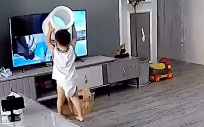 Baby Tries to Help On Screen Superhero, Then Breaks TV in the Process